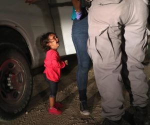 MCALLEN, TX - JUNE 12:  A two-year-old Honduran asylum seeker cries as her mother is searched and detained near the U.S.-Mexico border on June 12, 2018 in McAllen, Texas. The asylum seekers had rafted across the Rio Grande from Mexico and were detained by U.S. Border Patrol agents before being sent to a processing center for possible separation. Customs and Border Protection (CBP) is executing the Trump administration's "zero tolerance" policy towards undocumented immigrants. U.S. Attorney General Jeff Sessions also said that domestic and gang violence in immigrants' country of origin would no longer qualify them for political asylum status.  (Photo by John Moore/Getty Images)